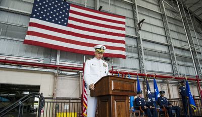 Adm. Philip S. Davidson, U.S. Indo-Pacific Command commander, provides remarks during the Pacific Air Forces (PACAF) assumption of command ceremony at Joint Base Pearl Harbor-Hickam, Hawaii, July 26, 2018. Davidson and Air Force Vice Chief of Staff Gen. Stephen W. Wilson presided over the ceremony in which Brown assumed command of PACAF. Brown now leads U.S. Indo-Pacific Command&#x27;s air component, delivering airpower across 53 percent of the globe.(U.S. Air Force photo by Staff Sgt. Jack Sanders)