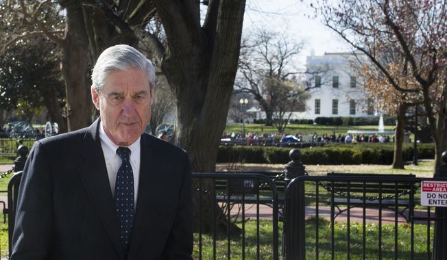 In this March 24, 2019, photo, special counsel Robert Mueller walks past the White House, after attending St. John&#x27;s Episcopal Church for morning services, in Washington. (AP Photo/Cliff Owen) ** FILE **