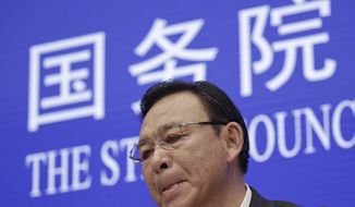 Tibet Executive vice governor Norbu Dondrup bites his lips during a press conference at the State Council Information Office in Beijing, Wednesday, March 27, 2019. Chinese officials responsible for Tibet are praising development in the Himalayan region in the 60 years since the suppression of an uprising against Beijing&#x27;s rule. Norbu Dondrup on Wednesday reviewed gains in the economy, health care and education since 1959 and castigated the self-declared government-in-exile established by Buddhist leader the Dalai Lama as illegitimate. The now-83-year-old Dalai Lama fled to India after the uprising was suppressed. (AP Photo/Andy Wong)