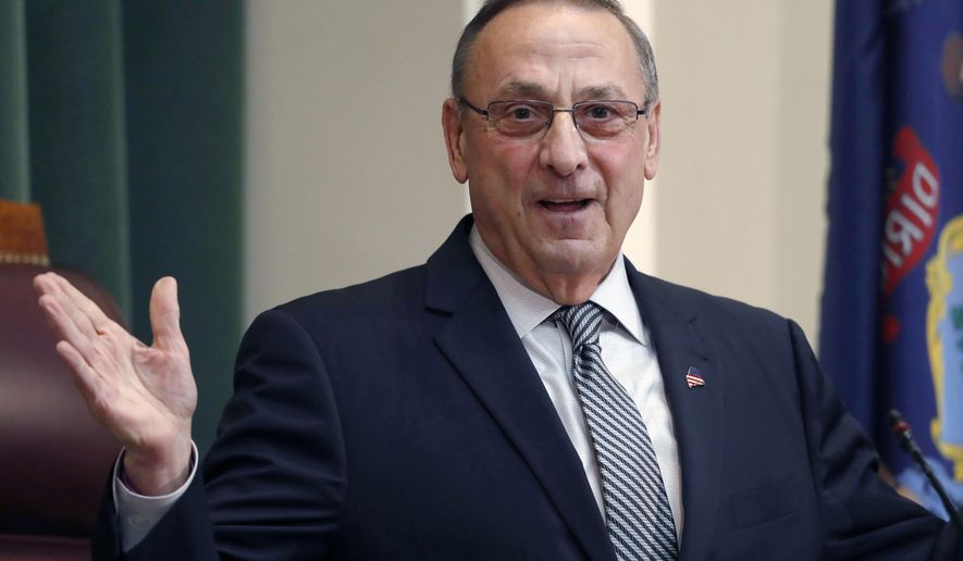 FILE - In this Feb. 13, 2018, file photo, Gov. Paul LePage delivers the State of the State address to the Legislature at the State House in Augusta, Maine. In March 2019 the state released a list of the 115 people pardoned by former Gov. LePage following a public records request by The Associated Press. (AP Photo/Robert F. Bukaty, File)