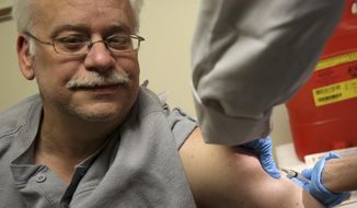 Steve Sierzega receives a measles, mumps and rubella vaccine at the Rockland County Health Department in Pomona, N.Y., Wednesday, March 27, 2019. The county in New York City&#39;s northern suburbs declared a local state of emergency Tuesday over a measles outbreak that has infected more than 150 people since last fall, hoping a ban against unvaccinated children in public places wakes their parents to the seriousness of the problem. (AP Photo/Seth Wenig)