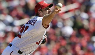 Washington Nationals starting pitcher Max Scherzer delivers a pitch during the third inning of an opening day baseball game against the New York Mets, Thursday, March 28, 2019, in Washington. (AP Photo/Nick Wass)