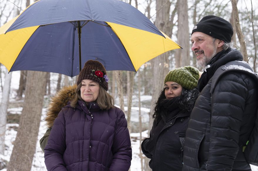 This undated image released by Cinetic Media shows filmmaker Kent Jones, right, with actress Mary Kay Place, left, and associate producer Gabi Madsen on the set of "Diane." The film is a modest and raw character study starring Place as a widower who spends her guilt-ridden days visiting her addicted and overbearing son, a soup kitchen and her diminishing community of friends and family. (Cinetic Media via AP)