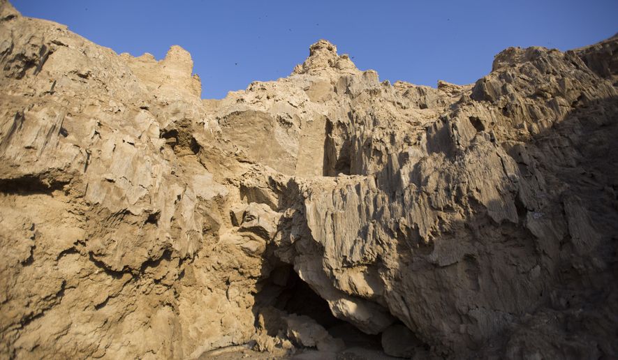 This Wednesday, March 27, 2019 photo, shows the entrance of the Malham Cave at the Dead Sea in Israel. Israeli researchers say they believe this to be the world’s longest salt cave, a network of twisting passageways at the southern tip of the Dead Sea. (AP Photo/Ariel Schalit)