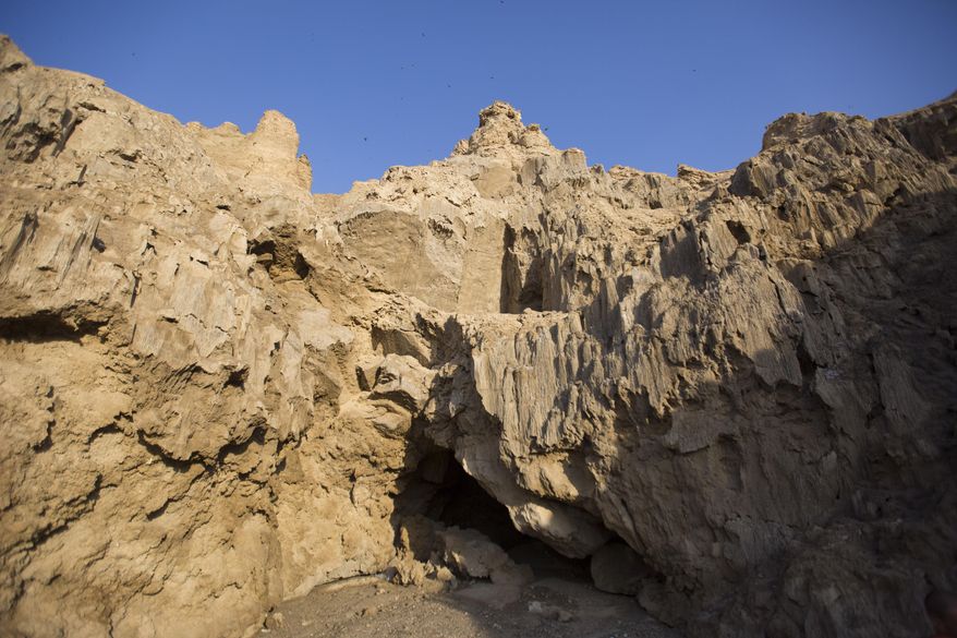 This Wednesday, March 27, 2019 photo, shows the entrance of the Malham Cave at the Dead Sea in Israel. Israeli researchers say they believe this to be the world’s longest salt cave, a network of twisting passageways at the southern tip of the Dead Sea. (AP Photo/Ariel Schalit)