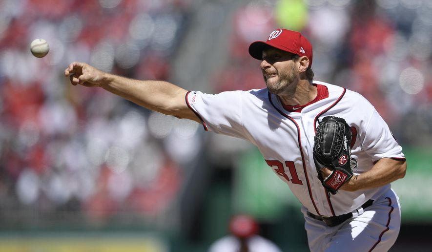 Washington Nationals starting pitcher Max Scherzer delivers a pitch during the first inning of a baseball game against the New York Mets, Thursday, March 28, 2019, in Washington. (AP Photo/Nick Wass)