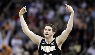Purdue&#39;s Ryan Cline celebrates after hitting a shot against Tennessee during the second half of a men&#39;s NCAA Tournament college basketball South Regional semifinal game Thursday, March 28, 2019, in Louisville, Ky. (AP Photo/Michael Conroy)