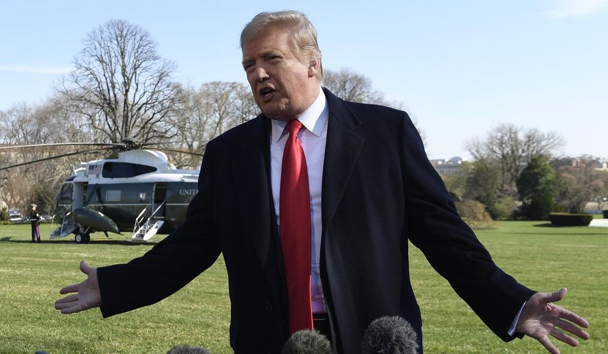 President Donald Trump talks with reporters before boarding Marine One on the South Lawn of the White House in Washington, Thursday, March 28, 2019, for the short trip to Andrews Air Force Base in Maryland. Trump is traveling to Michigan to speak at a rally before spending the weekend at his Mar-a-Lago estate in Florida. (AP Photo/Susan Walsh)