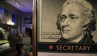This June 11, 2018, file photo shows an Alexander Hamilton exhibit called &amp;quot;Alexander Hamilton: Soldier, Secretary, Icon,&amp;quot; at Smithsonian National Postal Museum in Washington. Hamilton, determined to transform America into an industrial power, argued in 1791 that the United States needed “to procure all such machines as are known in any part of Europe.” Trouble was, Britain, the world’s technological leader, closely guarded its advantages. (AP Photo/Manuel Balce Ceneta, File)
