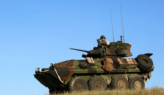 The LAV-25 (Light Armored Vehicle) is an eight-wheeled amphibious armored reconnaissance vehicle used by the United States Marine Corps, United States Army, and the Canadian Army. It was built by General Dynamics Land Systems Canada, developed from the Canadian built AVGP versions of the Swiss MOWAG Piranha 6x6 family of armored fighting vehicles. (U.S. Marine Corps photo by Cpl. John Robbart III)