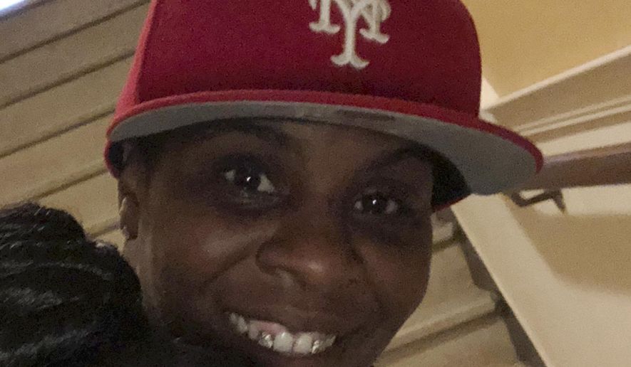 This 2018 photo provided by Tamika Ferguson shows her wife Wayzaro Walton in Hartford, Conn. Walton's supporters called on federal immigration authorities Wednesday, March 27, 2019, to rescind an order deporting Walton to her native England because of criminal convictions. A pardon by Connecticut officials for Walton took effect Wednesday but she remains in federal custody. (Tamika Ferguson via AP)