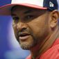 Washington Nationals manager Dave Martinez speaks to the media before an opening-day baseball game against the New York Mets, Thursday, March 28, 2019, in Washington. (AP Photo/Nick Wass)