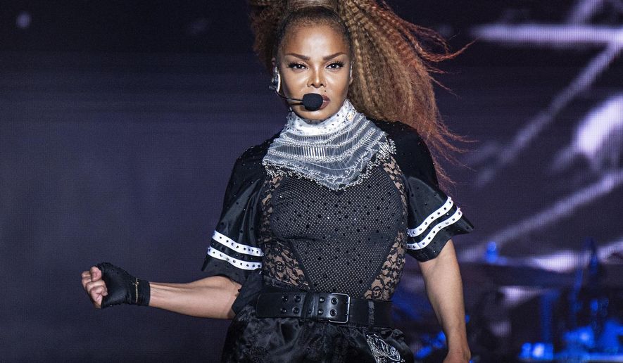 FILE - In this July 8, 2018 file photo, Janet Jackson performs at the 2018 Essence Festival in New Orleans. Jackson will join Def Leppard, Stevie Nicks, Radiohead, the Cure, Roxy Music and the Zombies as new members of the Rock and Roll Hall of Fame at the 34th induction ceremony on Friday, March 29 at Barclays Center in New York. (Photo by Amy Harris/Invision/AP, File)