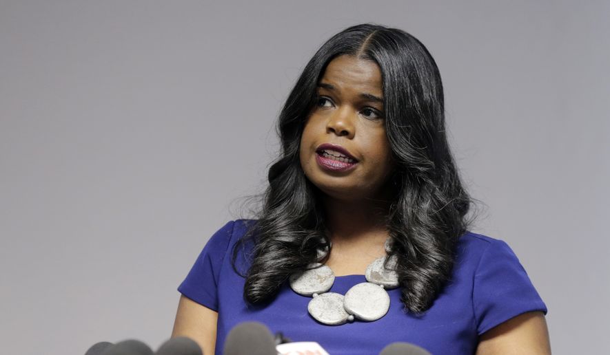 In this Feb. 22, 2019, file photo, Cook County State&#39;s Attorney Kim Foxx speaks at a news conference, in Chicago. Foxx says she’s open to an outside investigation into her office’s decision to drop all charges against Jussie Smollett. In a Friday night, March 29, 2019, op-ed for the Chicago Tribune, Foxx says a review about prosecutors’ decision to dismiss all 16 felony counts against the “Empire” actor would help maintain the “community’s trust.” (AP Photo/Kiichiro Sato, File)