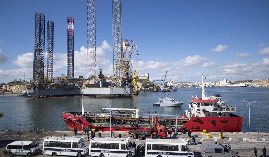 A view of Turkish oil tanker El Hiblu 1, which was hijacked by migrants, harbored in Valletta, Malta, Thursday March 28, 2019. A Maltese special operations team on Thursday boarded a tanker that had been hijacked by migrants rescued at sea, and returned control to the captain, before escorting it to a Maltese port. (AP Photo/Rene' Rossignaud)