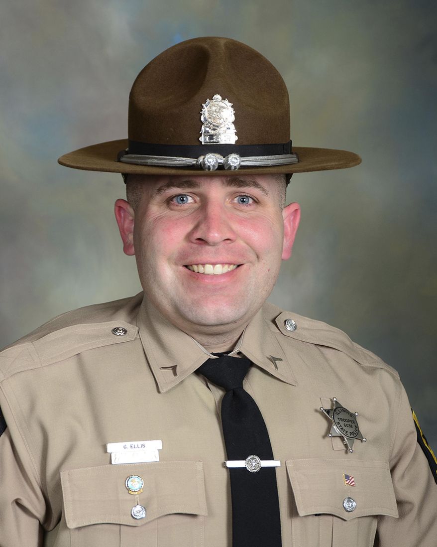 This photo provided by Illinois State Police shows Trooper Gerald Ellis. Illinois State Police say Ellis was killed while on-duty in his squad car when he was struck by a vehicle traveling the wrong way on Interstate 94 in northern Illinois. State police say the 36-year-old Trooper was driving home when he was struck early Saturday, March 30, 2019. in Green Oaks, Ill. Police say the wrong-way vehicle was traveling eastbound in the westbound expressway lanes and struck Ellis’ squad car head-on. (Illinois State Police via AP)