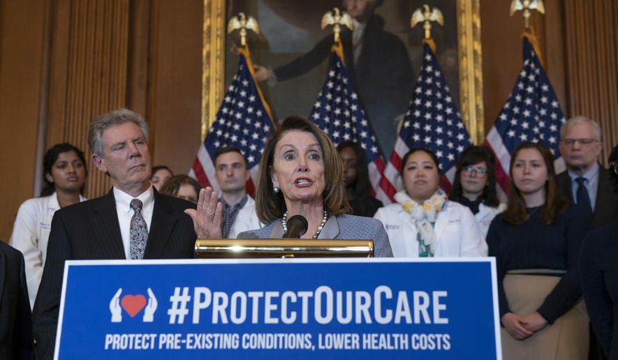 In this March 26, 2019, file photo, Speaker of the House Nancy Pelosi, D-Calif., joined at left by Energy and Commerce Committee Chair Frank Pallone, D-N.J., speaks at an event to announce legislation to lower health care costs and protect people with pre-existing medical conditions, at the Capitol in Washington. (AP Photo/J. Scott Applewhite) ** FILE **