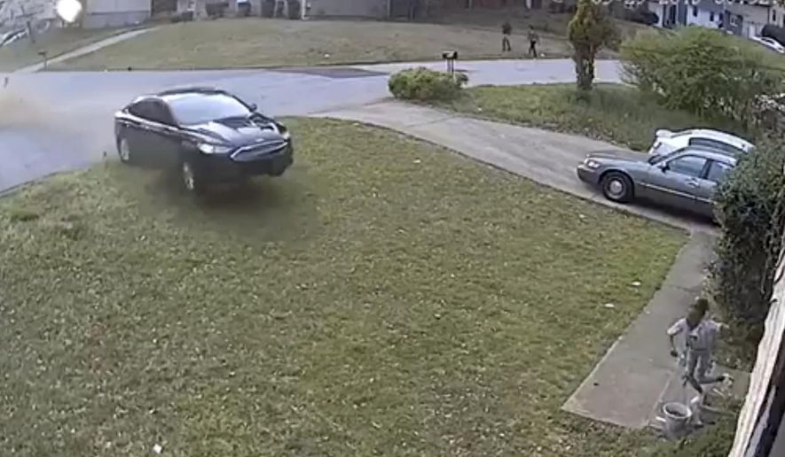 In this video frame grab made available by attorney Chris Stewart, shows a speeding car out of control before it hits LaDerihanna Holmes, 9, as she plays in her front yard Friday, March 29, 2019 in Lithonia, Ga. The driver is still at large. (Chris Stewart via AP)