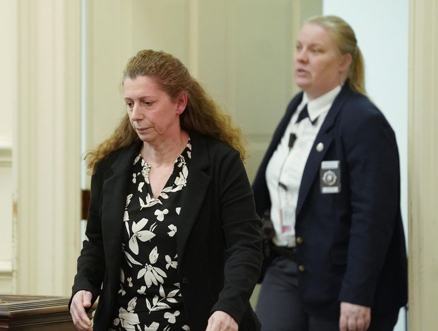 Carol Sharrow enters a courtroom at York County Superior Court in Alfred, Maine, on Tuesday, April 2, 2019. Sharrow was charged with the hit-and-run death of Douglas Parkhurst after she drove her car on to a baseball field in Sanford last June while a Babe Ruth League game was in progress. Sharrow was found not criminally responsible for the death because she had a manic episode at the time of the incident and did not have the ability to understand the wrongfulness of her behavior. She will be held at Riverview Psychiatric Center in Augusta. (Gregory Rec/Portland Press Herald via AP)