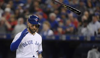 Toronto Blue Jays&#39; Kevin Pillar (11) tosses his bat after striking out during the fifth inning of a baseball game against the Detroit Tigers in Toronto, Thursday, March 28, 2019. (Nathan Denette/The Canadian Press via AP)