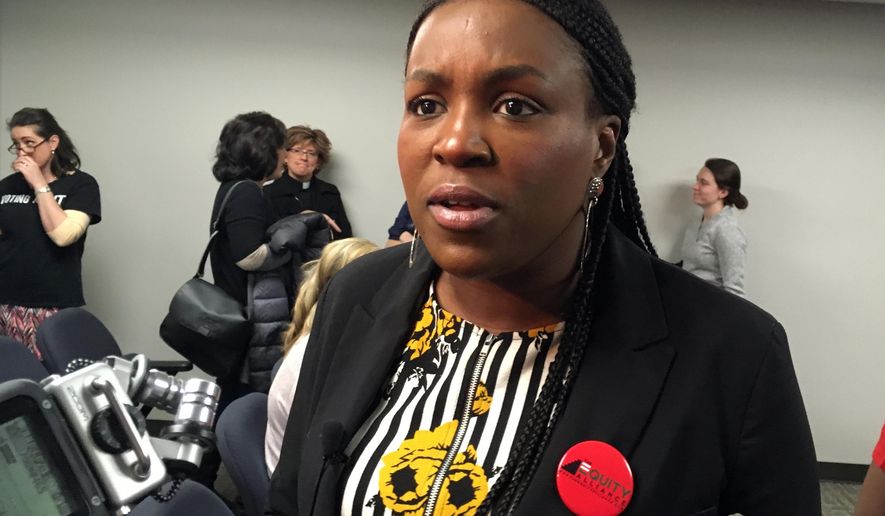 Tequila Johnson, co-founder of The Equity Alliance and a manager in last year's elections for the Tennessee Black Voter Project, speaks to reporters, Tuesday, April 2, 2019, at the Cordell Hull legislative building in Nashville, Tenn., after a news conference in opposition to a bill that would stiffen penalties if voter registration groups violate new restrictions. (AP Photo/Jonathan Mattise)