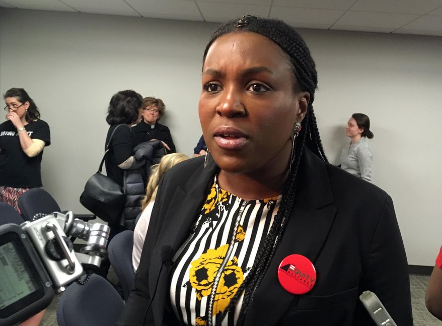 Tequila Johnson, co-founder of The Equity Alliance and a manager in last year's elections for the Tennessee Black Voter Project, speaks to reporters, Tuesday, April 2, 2019, at the Cordell Hull legislative building in Nashville, Tenn., after a news conference in opposition to a bill that would stiffen penalties if voter registration groups violate new restrictions. (AP Photo/Jonathan Mattise)