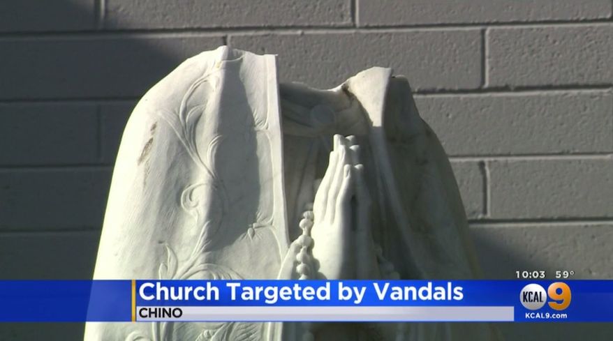 A statue of the Virgin Mary, which has stood for five decades, was beheaded Saint Margaret Mary's Church on March 30, 2019, in Pomona Valley, California. A stained glass window of Mary was smashed last month, along with similar statues at a nearby church. (Image: KCAL-9 Los Angeles screenshot)