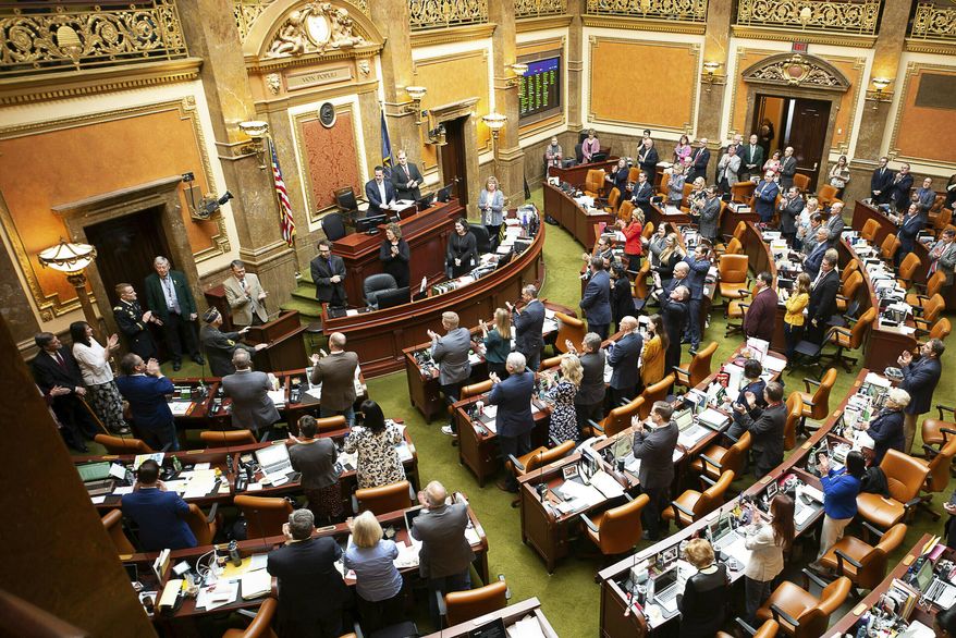 FILE - In this March 14, 2019, file photo, the House Representatives are shown on the last day of the 2019 Utah legislative session, at the Utah State Capitol. Utah Gov. Gary Herbert has signed a law banning most abortions after 18 weeks of gestation, setting the stage for a legal showdown. (Trent Nelson/The Salt Lake Tribune via AP, File)