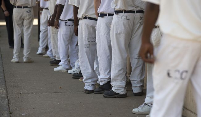 FILE- In this June 18, 2015 file photo, prisoners stand in a crowded lunch line during a prison tour at Elmore Correctional Facility in Elmore, Ala. he Justice Department has determined that Alabama&#x27;s prisons are violating the Constitution by failing to protect inmates from violence and sexual abuse and by housing them in unsafe and overcrowded facilities, according to a scathing report Wednesda, April 3, 2019, that described the problems as &amp;quot;severe&amp;quot; and &amp;quot;systemic.&amp;quot;. (AP Photo/Brynn Anderson)