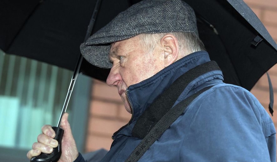 Hillsborough match commander David Duckenfield arrives at Preston Crown Court in Preston, England, Wednesday, April 3, 2019. A British jury has failed to reach a decision on whether the man in control of police operations at the 1989 Hillsborough Stadium tragedy that left 96 people dead is guilty of gross negligence manslaughter. Jurors at Preston Crown Court in northern England deliberated for eight days in the case of David Duckenfield, 74, who has denied the 95 charges. (Aaron Chown/PA via AP)