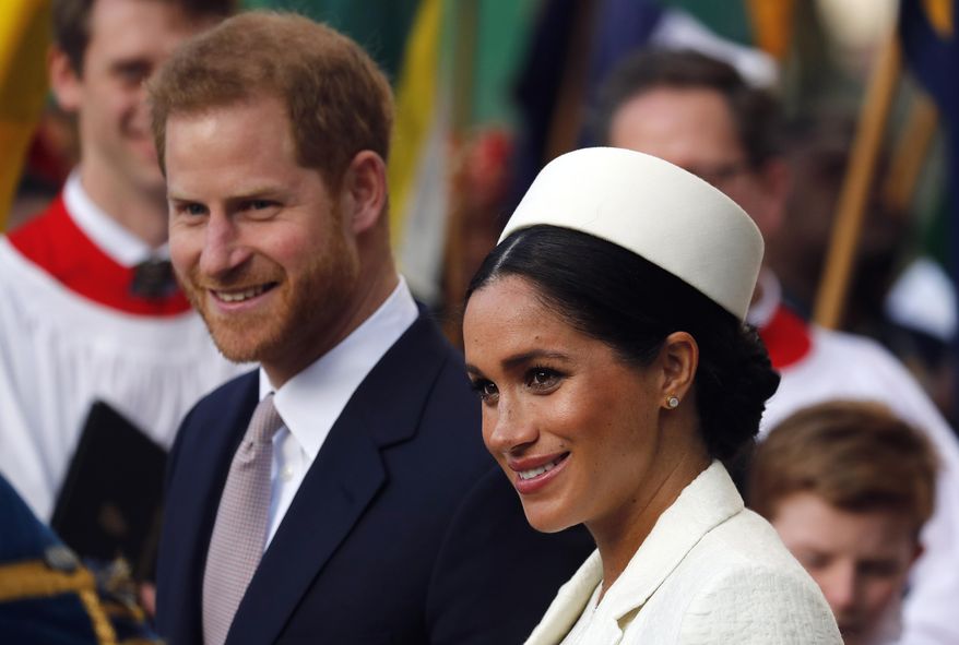 In this Monday, March 11, 2019, file photo, Britain's Prince Harry and Meghan, the Duchess of Sussex, leave after the Commonwealth Service at Westminster Abbey in London. (AP Photo/Frank Augstein, file)