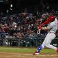 Philadelphia Phillies&#39; Bryce Harper hits a two-run homer during the eighth inning of a baseball game against the Washington Nationals at Nationals Park, Tuesday, April 2, 2019, in Washington. The Phillies won 8-2. (AP Photo/Alex Brandon)