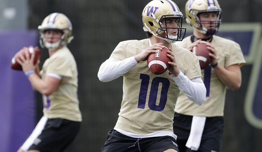 Washington quarterback Jacob Eason (10) drops to pass during the first day of spring NCAA college football practice, Wednesday, April 3, 2019, in Seattle. (AP Photo/Ted S. Warren)