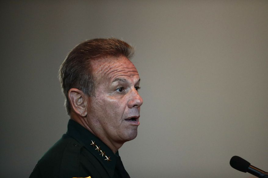 In this Nov. 15, 2018, file photo, Broward County Sheriff Scott Israel speaks before the state commission in Sunrise, Fla. A judge on Thursday, April 4. 2019, dismissed a lawsuit filed by Israel, whom Gov. Ron DeSantis suspended after accusing him of failing to prevent the Parkland school shooting. (AP Photo/Brynn Anderson, File)