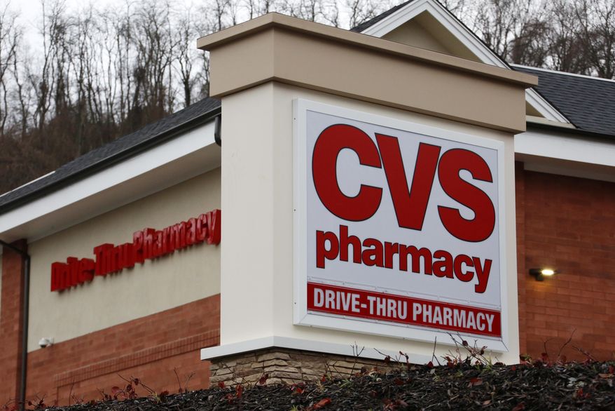 FILE - This Jan. 18, 2017, file photo shows a CVS Pharmacy in Pittsburgh. CVS Health is expanding same-day prescription deliveries nationwide in the latest push by drugstores to keep customers who don’t want to wait and are doing more shopping online. (AP Photo/Gene J. Puskar, File)