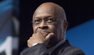 FILE - In this June 20, 2014 file photo, Herman Cain, CEO, The New Voice, speaks during Faith and Freedom Coalition&#39;s Road to Majority event in Washington. President Donald Trump said Thursday, April 4, 2019, he is recommending Herman Cain, a political ally and former presidential candidate, for a seat on the Federal Reserve board. (AP Photo/Molly Riley, File)