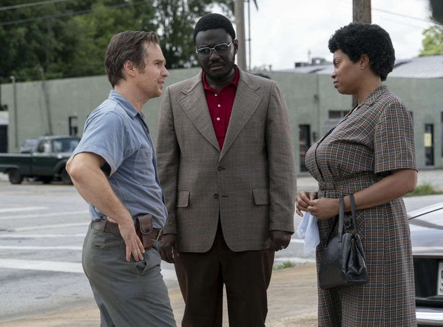 This image released by STXfilms shows, from left, Sam Rockwell, Babou Ceesay and Taraji P. Henson in a scene from "The Best of Enemies." (Annette Brown/STXfilms via AP)