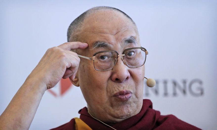 Tibetan spiritual leader the Dalai Lama speaks during a press conference after talking to an audience of educators, in New Delhi, India, Thursday, April 4, 2019. The Dalai Lama says he has been seeking a mutually acceptable solution to the Tibetan issue with China since 1974 but that Beijing considers him a "splittist."(AP Photo/Manish Swarup)