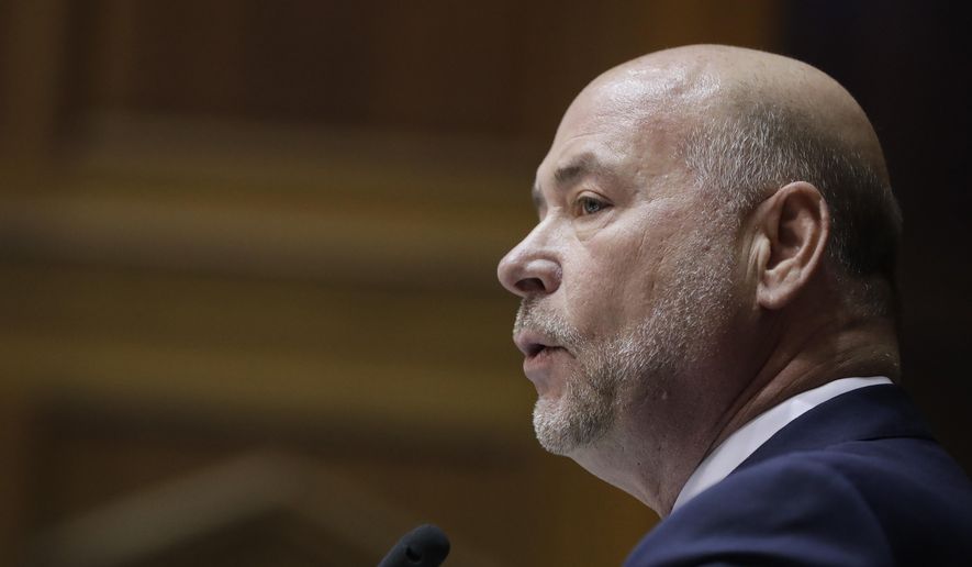 FILE - In this Tuesday, Nov. 20, 2018 file photo, House Speaker Brian Bosma, R-Indianapolis, speaks at the Statehouse in Indianapolis. The Indiana House Ethics Committee has hired an outside attorney to investigate allegations that House Speaker Bosma used campaign funds to collect unflattering information about a former intern who claims she had a sexual encounter with him decades ago. (AP Photo/Darron Cummings File)
