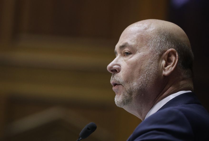 FILE - In this Tuesday, Nov. 20, 2018 file photo, House Speaker Brian Bosma, R-Indianapolis, speaks at the Statehouse in Indianapolis. The Indiana House Ethics Committee has hired an outside attorney to investigate allegations that House Speaker Bosma used campaign funds to collect unflattering information about a former intern who claims she had a sexual encounter with him decades ago. (AP Photo/Darron Cummings File)