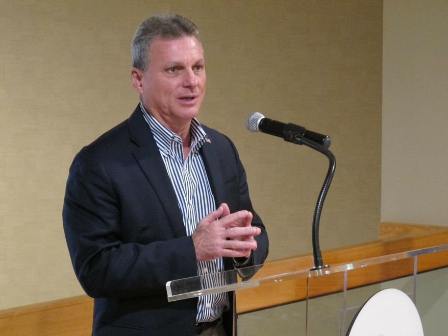 FILE- In this Nov. 17, 2017, U.S. Rep. Buddy Carter speaks to reporters at the Port of Savannah, Ga. Carter has asked the Trump administration to exclude the Georgia coast from its plans for expanding offshore oil drilling. Carter’s letter to acting Interior Secretary David Bernhardt on Wednesday April 3, 2019, came a day after Georgia state lawmakers passed a resolution opposing offshore drilling, saying it could harm tourism and commercial fishing. (AP Photo/Russ Bynum, File)