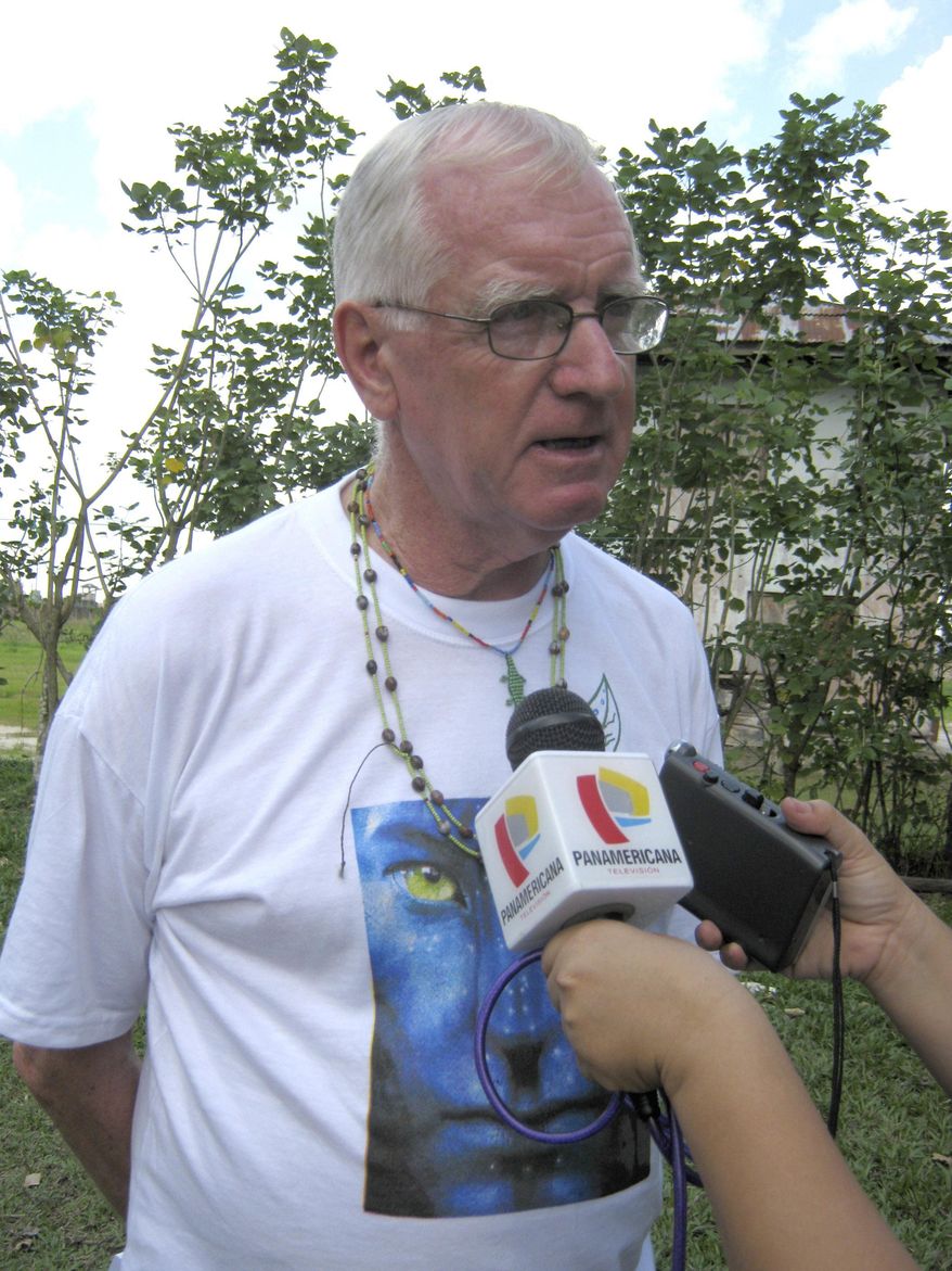 FILE - In this July 2, 2010, file photo, British brother Paul McAuley talks to reporters in Iquitos, Peru. The British religious activist who faced expulsion from Peru a decade ago for his work on behalf of indigenous communities was found dead Tuesday at a youth hostel he ran in the Amazon rain forest. (Rosa Cardenas/La Republica via AP, File)