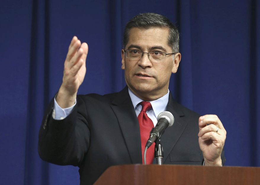 FILE - In this March 5, 2019 file photo, California Attorney General Xavier Becerra discusses the decision that his office will not file criminal charges against the two Sacramento Police officers in last year's fatal shooting of Stephon Clark, during a news conference in Sacramento, Calif. Becerra said Thursday, April 4, that he won’t release older records on state law enforcement agents’ misconduct despite a recently released appeals court ruling that they are public documents. (AP Photo/Rich Pedroncelli, File)