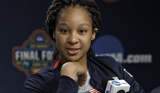 In this Thursday April 4, 2019, photo, Maori Davenport answers a question during a news conference in Tampa, Fla. Davenport is back playing basketball again. The Alabama high school senior is at the Final Four working out with the U.S. junior national 3-on-3 team. (AP Photo/Chris O&#x27;Meara)