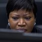 FILE - In this file photo dated Thursday, Jan. 28, 2016, Chief Prosecutor Fatou Bensouda waits for the start of the trial against former Ivory Coast president Laurent Gbagbo at the International Criminal Court in The Hague, Netherlands. The prosecutor of the International Criminal Court says she has had her U.S. visa revoked, in the first implementation of an American crackdown on the global tribunal. (AP Photo/Peter Dejong)