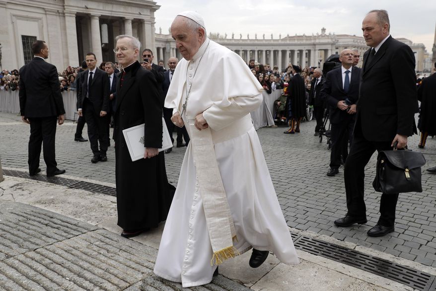 Pope Francis arrives for his weekly general audience, in St. Peter's Square, at the Vatican, Wednesday, April 3, 2019. (AP Photo/Gregorio Borgia)