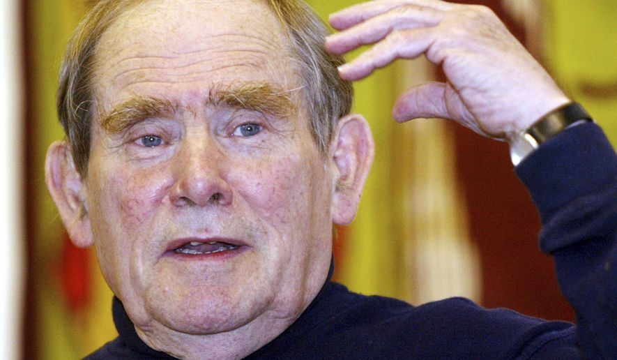 FILE - In this Oct. 8, 2002, file photo, Sydney Brenner, a professor in the Molecular Sciences Institute in Berkeley, Calif., gestures during a press conference in Munich, Germany. Brenner, a Nobel Prize-winning biologist who helped decipher the genetic code and whose research on a roundworm laid the groundwork for decades of human disease research, has died. The Salk Institute for Biological Studies in California said Brenner died Friday, April 5, 2019 in Singapore. He was 92. (AP Photo/Jan Pitman, File)