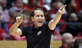 FILE - In this Jan. 5, 2019, file photo, Nevada coach Eric Musselman gives instructions to his players from the sideline during the second half of the team&#39;s NCAA college basketball game against New Mexico in Albuquerque, N.M. Arkansas has hired Musselman as its next men’s basketball coach. Razorbacks athletic director Hunter Yurachek announced Musselman’s hiring Sunday, April 7, on Twitter. (AP Photo/Andres Leighton, File)