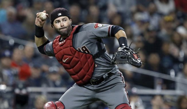 Arizona Diamondbacks catcher Alex Avila throws out San Diego Padres&#x27; Wil Myers on a ground out during the first inning of a baseball game in San Diego, Monday, April 1, 2019. (AP Photo/Alex Gallardo) **FILE**