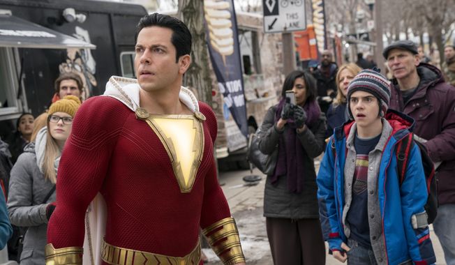 This image released by Warner Bros. shows Zachary Levi, left, and Jack Dylan Grazer in a scene from &amp;quot;Shazam!&amp;quot; (Steve Wilkie/Warner Bros. Entertainment via AP)